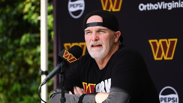 Aug 15, 2024; Miami Gardens, FL, USA;  Washington Commanders head coach Dan Quinn talks to reporters before joint practice with the Miami Dolphins at Baptist Health Training Complex. Mandatory Credit: Sam Navarro-Imagn Images