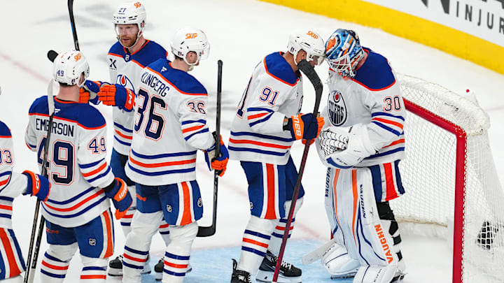 Edmonton Oilers players celebrate after defeating the Vegas Golden Knights 4-2