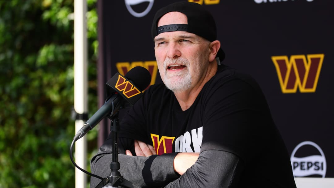Aug 15, 2024; Miami Gardens, FL, USA;  Washington Commanders head coach Dan Quinn talks to reporters before joint practice with the Miami Dolphins at Baptist Health Training Complex. Mandatory Credit: Sam Navarro-USA TODAY Sports
