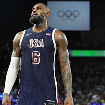 Aug 10, 2024; Paris, France; United States guard LeBron James (6) celebrates after defeating France in the men's basketball gold medal game during the Paris 2024 Olympic Summer Games at Accor Arena. Mandatory Credit: Rob Schumacher-Imagn Images