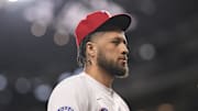 Jul 2, 2025; Arlington, Texas, USA; Detroit Pistons point guard Cade Cunningham waits to throw out the first pitch before the game between the Texas Rangers and the Baltimore Orioles at Globe Life Field. Mandatory Credit: Jerome Miron-Imagn Images