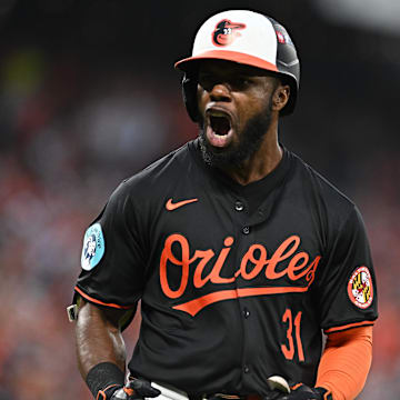 Oct 2, 2024; Baltimore, Maryland, USA; Baltimore Orioles outfielder Cedric Mullins (31) celebrates a solo home run against the Kansas City Royals in the fifth inning in game two of the Wild Card round for the 2024 MLB Playoffs at Oriole Park at Camden Yards. Tommy Gilligan-Imagn Images