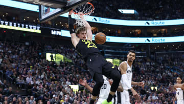 Mar 27, 2024; Salt Lake City, Utah, USA; Utah Jazz forward Lauri Markkanen (23) dunks the ball against the San Antonio Spurs during the second quarter at Delta Center.