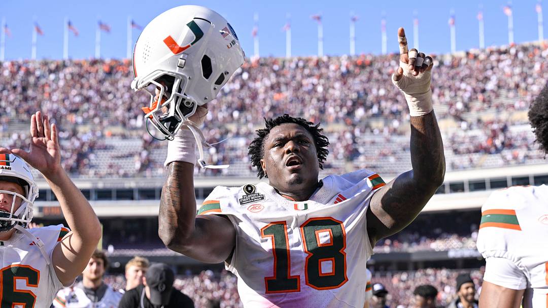 Dec 20, 2025; College Station, TX, USA; Miami Hurricanes defensive lineman Armondo Blount (18) holds up his helmet as he celebrates the Hurricanes win over the Texas A&M Aggies at Kyle Field. Mandatory Credit: Jerome Miron-Imagn Images