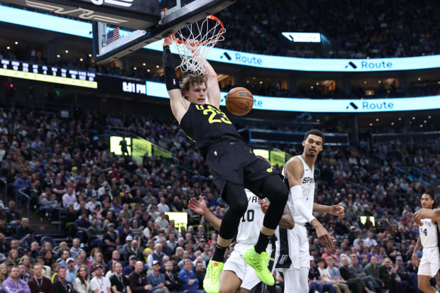 Utah Jazz forward Lauri Markkanen (23) dunks the ball against the San Antonio Spurs during the second quarter at Delta Center