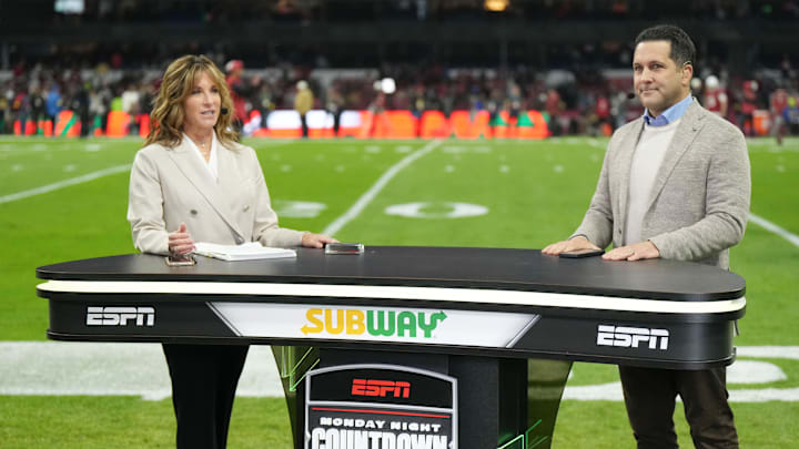 Broadcasters Suzy Kolber and Adam Schefter of ESPN s Monday Night Football Countdown are seen on the sideline 