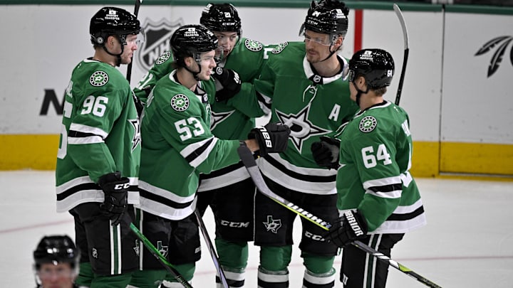 Apr 12, 2025; Dallas, Texas, USA; Dallas Stars right wing Mikko Rantanen (96) and center Wyatt Johnston (53) and left wing Jason Robertson (21) and center Roope Hintz (24) and center Mikael Granlund (64) celebrates a power play goal scored by Robertson against the Utah Hockey Club during the first period at the American Airlines Center. Mandatory Credit: Jerome Miron-Imagn Images