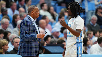 North Carolina HC Hubert Davis, G Ian Jackson