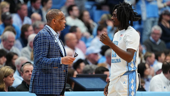 North Carolina HC Hubert Davis, G Ian Jackson