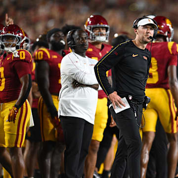 Sep 7, 2024; Los Angeles, California, USA; USC Trojans head coach Lincoln Riley reacts against the Utah State Aggies during the first quarter at United Airlines Field at Los Angeles Memorial Coliseum. 