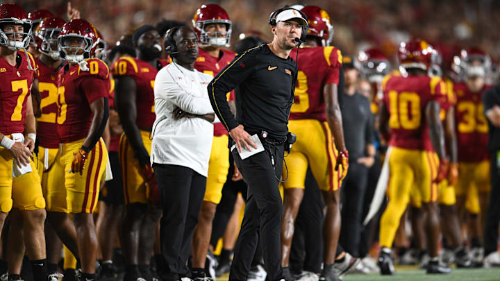 Sep 7, 2024; Los Angeles, California, USA; USC Trojans head coach Lincoln Riley reacts against the Utah State Aggies during the first quarter at United Airlines Field at Los Angeles Memorial Coliseum. Mandatory Credit: Jonathan Hui-Imagn Images