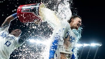 Jul 22, 2024; Kansas City, Missouri, USA; Kansas City Royals shortstop Bobby Witt Jr. (7) is doused with water by catcher Salvador Perez (13) after defeating the Arizona Diamondbacks at Kauffman Stadium. Mandatory Credit: Jay Biggerstaff-USA TODAY Sports