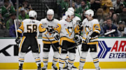 Apr 5, 2025; Dallas, Texas, USA; Pittsburgh Penguins defenseman Kris Letang (58) and 
ight wing Rutger McGroarty (2) and center Evgeni Malkin (71) and defenseman Erik Karlsson (65) celebrate after Penguins center Sidney Crosby (87) scores a power play goal against the Dallas Stars during the first period at the American Airlines Center. Mandatory Credit: Jerome Miron-Imagn Images