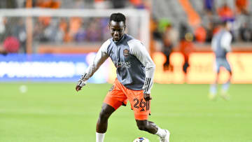 Feb 24, 2024; Houston, Texas, USA; Houston Dynamo FC midfielder Ousmane Sylla (26) warms up prior to the match against Sporting Kansas City at Shell Energy Stadium. Mandatory Credit: Maria Lysaker-USA TODAY Sports