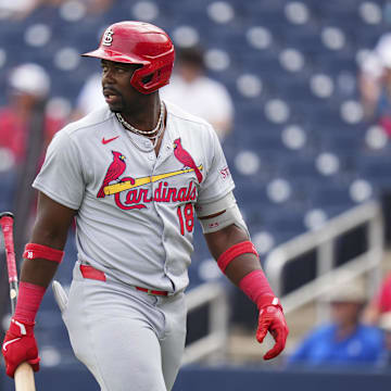 Jordan Walker walks back to the dugout during a spring training game against the Washington Nationals. 