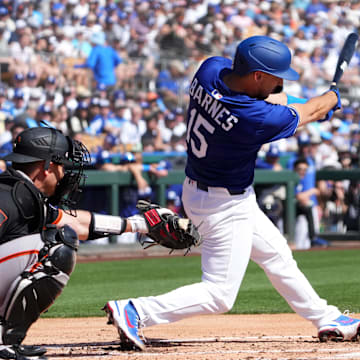 Mar 1, 2025; Phoenix, Arizona, USA; Los Angeles Dodgers catcher Austin Barnes (15) bats against the San Francisco Giants during the second inning at Camelback Ranch-Glendale. Mandatory Credit: Joe Camporeale-Imagn Images