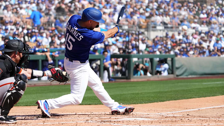Mar 1, 2025; Phoenix, Arizona, USA; Los Angeles Dodgers catcher Austin Barnes (15) bats against the San Francisco Giants during the second inning at Camelback Ranch-Glendale. Mar 1, 2025; Phoenix, Arizona, USA; Los Angeles Dodgers catcher Austin Barnes (15) bats against the San Francisco Giants during the second inning at Camelback Ranch-Glendale.