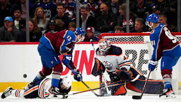 Mar 21, 2022; Denver, Colorado, USA; Colorado Avalanche right wing Valeri Nichushkin (13) and center Nazem Kadri (91) attempt to score past Edmonton Oilers defenseman Kris Russell (6) and goaltender Mike Smith (41) in the third  period at Ball Arena. Mandatory Credit: Ron Chenoy-Imagn Images
