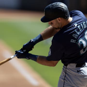 Seattle Mariners catcher Cal Raleigh hits a home run during a game against the Oakland Athletics on Thursday at Oakland Coliseum.