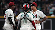 Jun 9, 2025; Phoenix, Arizona, USA; Arizona Diamondbacks pitcher Justin Martinez (63) leaves the game after an injury against the Seattle Mariners in the ninth inning at Chase Field. Mandatory Credit: Rick Scuteri-Imagn Images