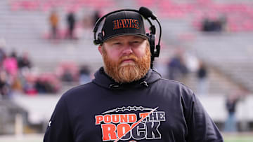 Grafton head football coach Jim Norris walks the sideline during the WIAA Division 3 state championship game against Reedsburg at Camp Randall Stadium in Madison on Friday, Nov. 21, 2025.