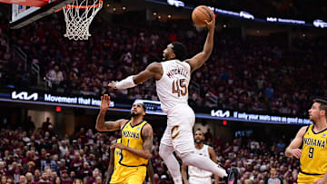 May 4, 2025; Cleveland, Ohio, USA; Cleveland Cavaliers guard Donovan Mitchell (45) dunks during the second half against the Indiana Pacers in game one of the second round for the 2025 NBA Playoffs at Rocket Arena. Mandatory Credit: Ken Blaze-Imagn Images