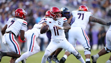 Nov 23, 2024; Fort Worth, Texas, USA;  Arizona Wildcats quarterback Noah Fifita (11) throws a pass against the TCU Horned Frogs in the second half at Amon G. Carter Stadium. Mandatory Credit: Tim Heitman-Imagn Images