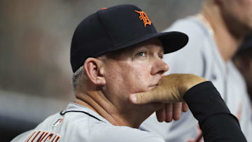 Apr 28, 2025; Houston, Texas, USA; Detroit Tigers manager A.J. Hinch (14) looks on from the dugout during the second inning against the Houston Astros at Daikin Park. Mandatory Credit: Troy Taormina-Imagn Images