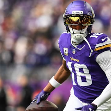 Nov 9, 2025; Minneapolis, Minnesota, USA; Minnesota Vikings wide receiver Justin Jefferson (18) warms up before the game against the Baltimore Ravens at U.S. Bank Stadium.