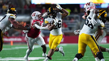 Oct 11, 2025; Madison, Wisconsin, USA; Iowa Hawkeyes running back Xavier Williams (26) runs the ball during the second half against the Wisconsin Badgers at Camp Randall Stadium. Mandatory Credit: Ross Harried-Imagn Images