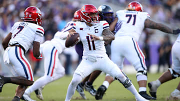 Nov 23, 2024; Fort Worth, Texas, USA;  Arizona Wildcats quarterback Noah Fifita (11) throws a pass against the TCU Horned Frogs in the second half at Amon G. Carter Stadium. Mandatory Credit: Tim Heitman-Imagn Images