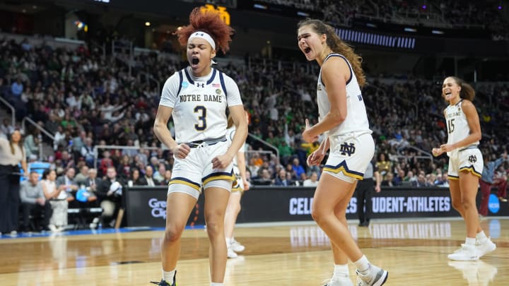 Mar 29, 2024; Albany, NY, USA; Notre Dame Fighting Irish guard Hannah Hidalgo (3) and Notre Dame Fighting Irish forward Maddy Westbeld (21) react to a play on the court during the second half in the semifinals of the Albany Regional of the 2024 NCAA Tournament at the MVP Arena.