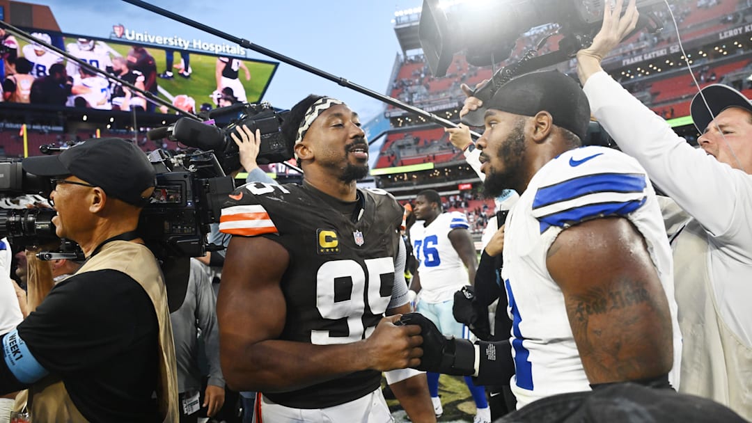 Sep 8, 2024; Cleveland, Ohio, USA; Cleveland Browns defensive end Myles Garrett (95) talks to Dallas Cowboys linebacker Micah Parsons (11) after the game at Huntington Bank Field. Mandatory Credit: Ken Blaze-Imagn Images
