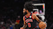 Mar 19, 2025; Phoenix, Arizona, USA; Chicago Bulls guard Coby White (0) dribbles against the Phoenix Suns during the first half at PHX Aena. Mandatory Credit: Joe Camporeale-Imagn Images