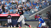 Aug 27, 2025; Toronto, Ontario, CAN; Minnesota Twins centre fielder Byron Buxton (25) hits a home run against the Toronto Blue Jays during the first inning at Rogers Centre. Mandatory Credit: Nick Turchiaro-Imagn Images