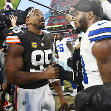 Sep 8, 2024; Cleveland, Ohio, USA; Cleveland Browns defensive end Myles Garrett (95) talks to Dallas Cowboys linebacker Micah Parsons (11) after the game at Huntington Bank Field. Mandatory Credit: Ken Blaze-Imagn Images