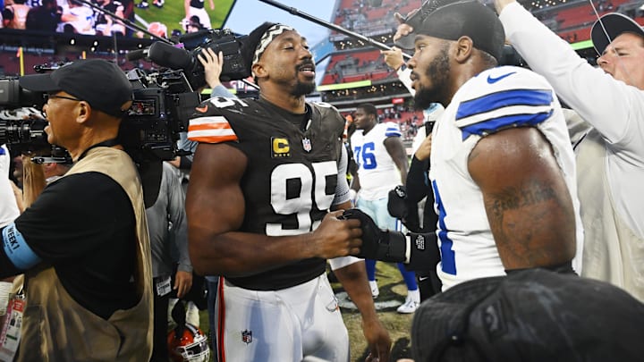 Sep 8, 2024; Cleveland, Ohio, USA; Cleveland Browns defensive end Myles Garrett (95) talks to Dallas Cowboys linebacker Micah Parsons (11) after the game at Huntington Bank Field. Mandatory Credit: Ken Blaze-Imagn Images