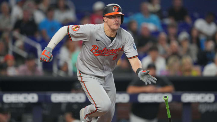 Jul 25, 2024; Miami, Florida, USA;  Baltimore Orioles first baseman Ryan Mountcastle (6) hits a double against the Miami Marlins in the eighth inning at loanDepot Park.