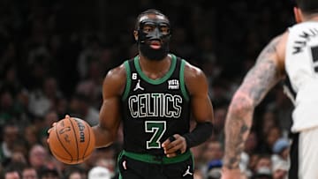 Mar 26, 2023; Boston, Massachusetts, USA; Boston Celtics guard Jaylen Brown (7) dribbles the ball against the San Antonio Spurs during the third quarter at the TD Garden. Mandatory Credit: Brian Fluharty-Imagn Images