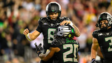 Oct 12, 2024; Eugene, Oregon, USA; Oregon Ducks quarterback Dillon Gabriel (8) celebrates a touchdown run during the second half against the Ohio State Buckeyes at Autzen Stadium. Mandatory Credit: Craig Strobeck-Imagn Images