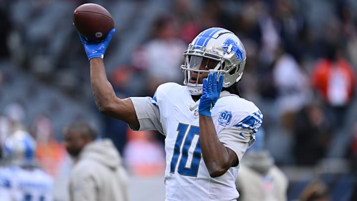 Dec 10, 2023; Chicago, Illinois, USA;  Detroit Lions quarterback Teddy Bridgewater (10) warms up before a game against the Chicago Bears at Soldier Field. Mandatory Credit: Jamie Sabau-Imagn Images