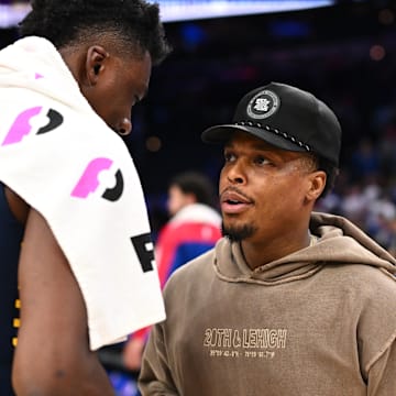 Kyle Lowry talks to the Pacers' Thomas Bryant.