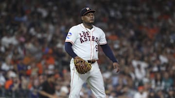 Sep 20, 2025; Houston, Texas, USA; Houston Astros starting pitcher Framber Valdez (59) reacts after a play during the fourth inning against the Seattle Mariners at Daikin Park. Mandatory Credit: Troy Taormina-Imagn Images