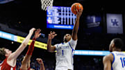 Jan 18, 2025; Lexington, Kentucky, USA; Kentucky Wildcats guard Lamont Butler (1) goes to the basket during the second half against the Alabama Crimson Tide at Rupp Arena at Central Bank Center. Mandatory Credit: Jordan Prather-Imagn Images