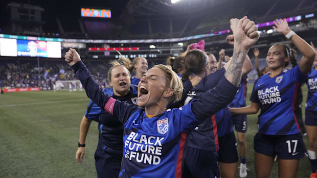 Seattle Reign midfielder Jessica Fishlock celebrates after clinching the 2022 NWSL Shield.
