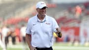 Houston Cougars head coach Willie Fritz walks on the field before the game against the Stephen F. Austin Lumberjacks