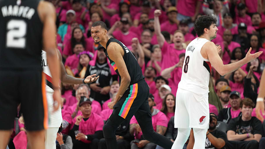 San Antonio Spurs forward Victor Wembanyama reacts after drawing a foul while scoring against the Portland Trail Blazers.