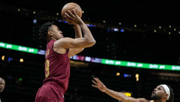 Oct 10, 2023; Atlanta, Georgia, USA; Cleveland Cavaliers guard Zhaire Smith (19) shoots over Atlanta Hawks guard Patty Mills (8) during the second half at State Farm Arena. Mandatory Credit: Dale Zanine-USA TODAY Sports
