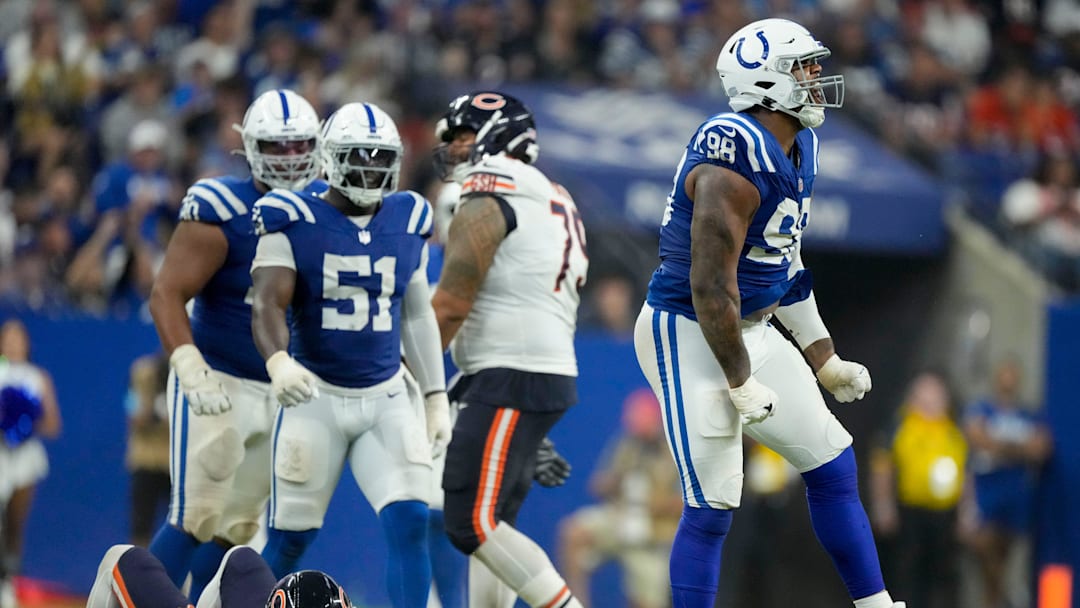 Indianapolis Colts defensive tackle Raekwon Davis (98) celebrates after making a stop Sunday, Sept. 22, 2024, during a game against the Chicago Bears at Lucas Oil Stadium in Indianapolis.
