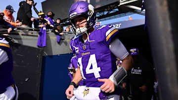 Nov 24, 2024; Chicago, Illinois, USA; Minnesota Vikings quarterback Sam Darnold (14) enters the field before the game against the Chicago Bears at Soldier Field. Mandatory Credit: Daniel Bartel-Imagn Images